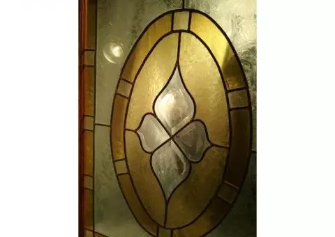 Framed stained glass window with gold color